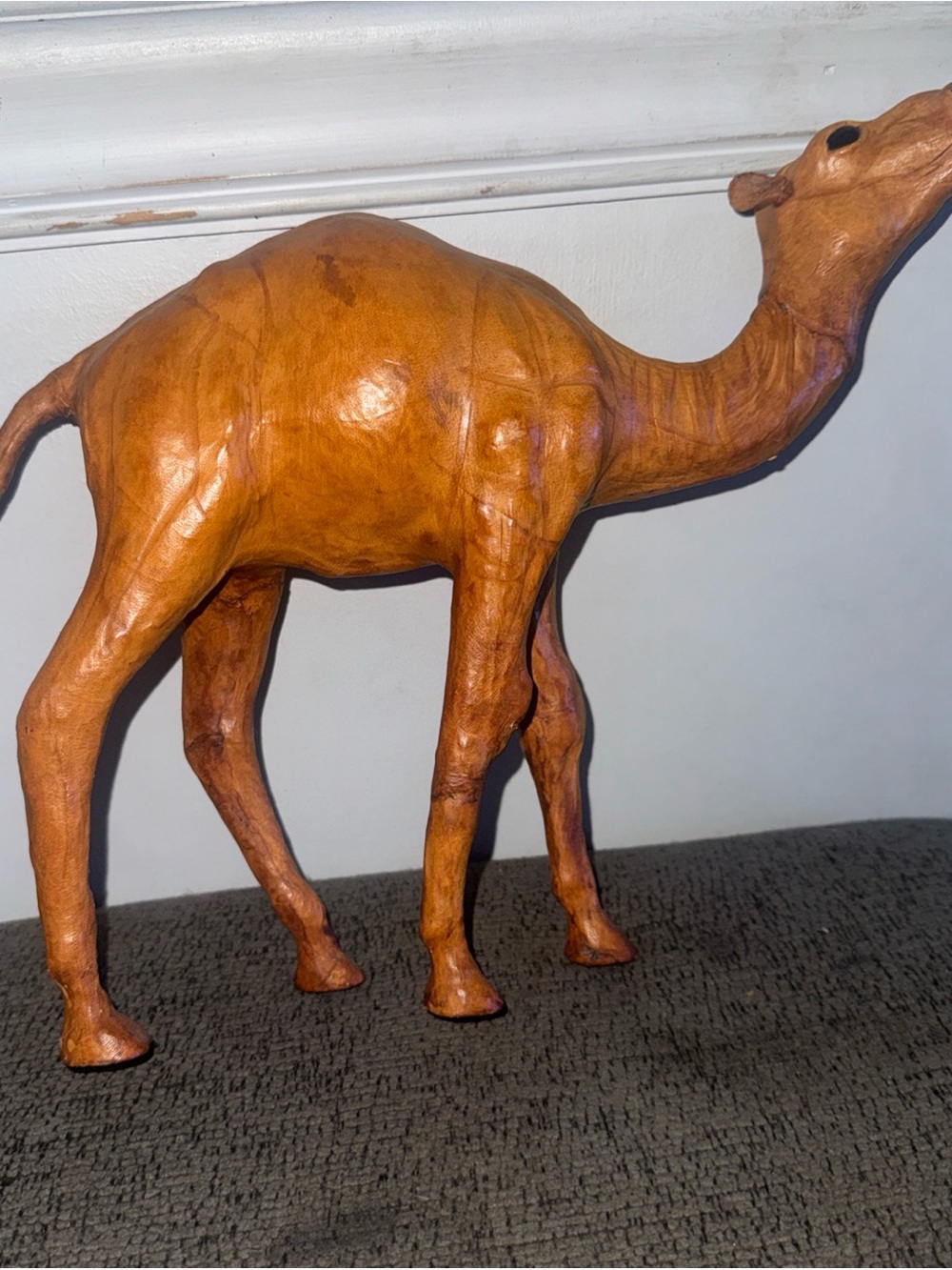 Leather wrapped camel antique